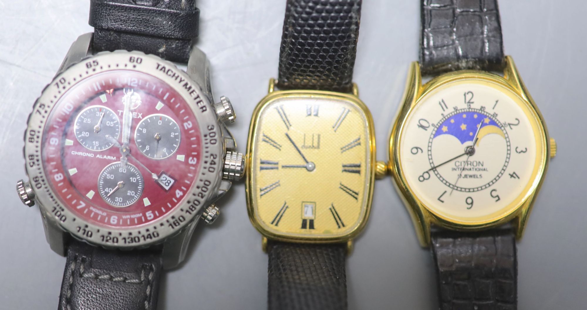 Seven assorted wrist watches including two Timex and an Omnia and two pocket watches.